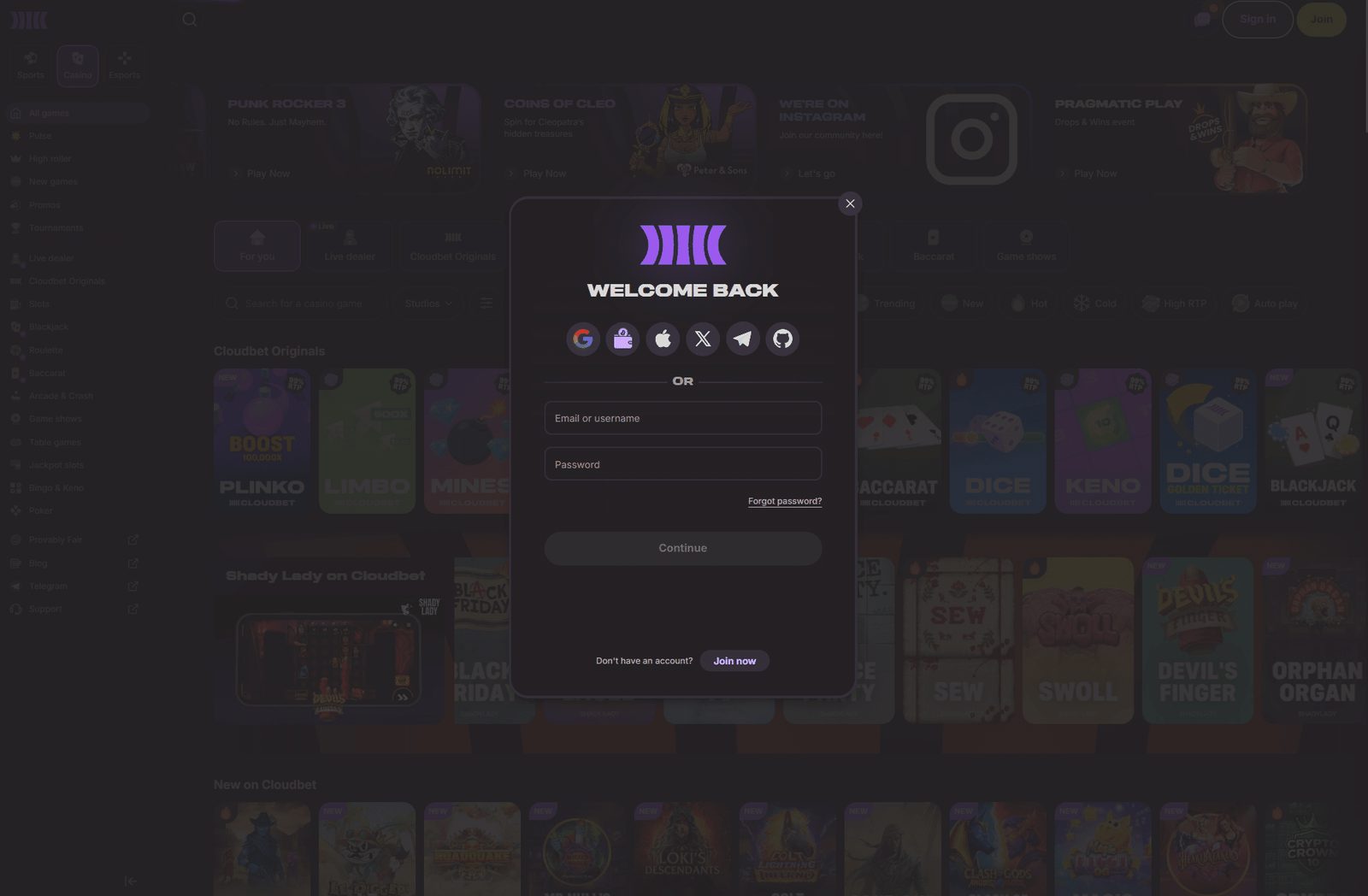 Cloudbet review login page showing secure account sign in form with Google, Apple and social login options.