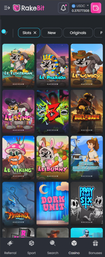 Rakebit mobile casino app displaying slot games sportsbook navigation and crypto gaming interface