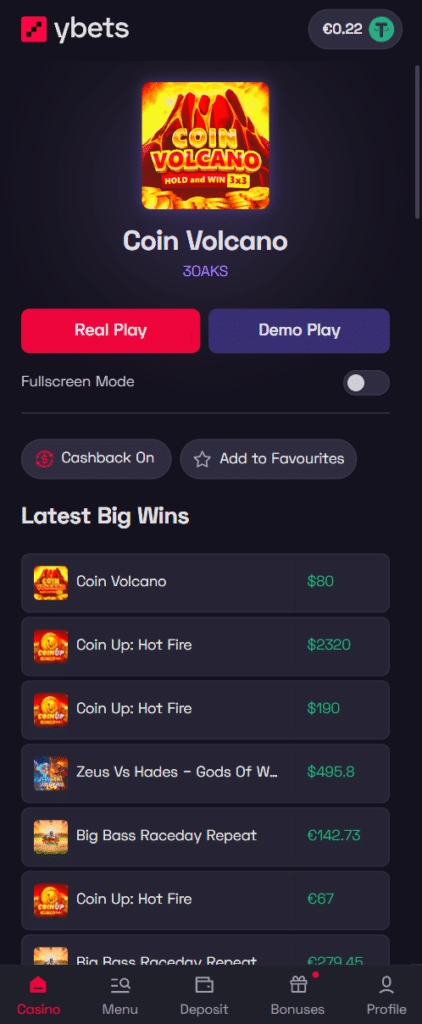 Ybets mobile casino interface showing Coin Volcano slot game cashback rewards and latest big wins